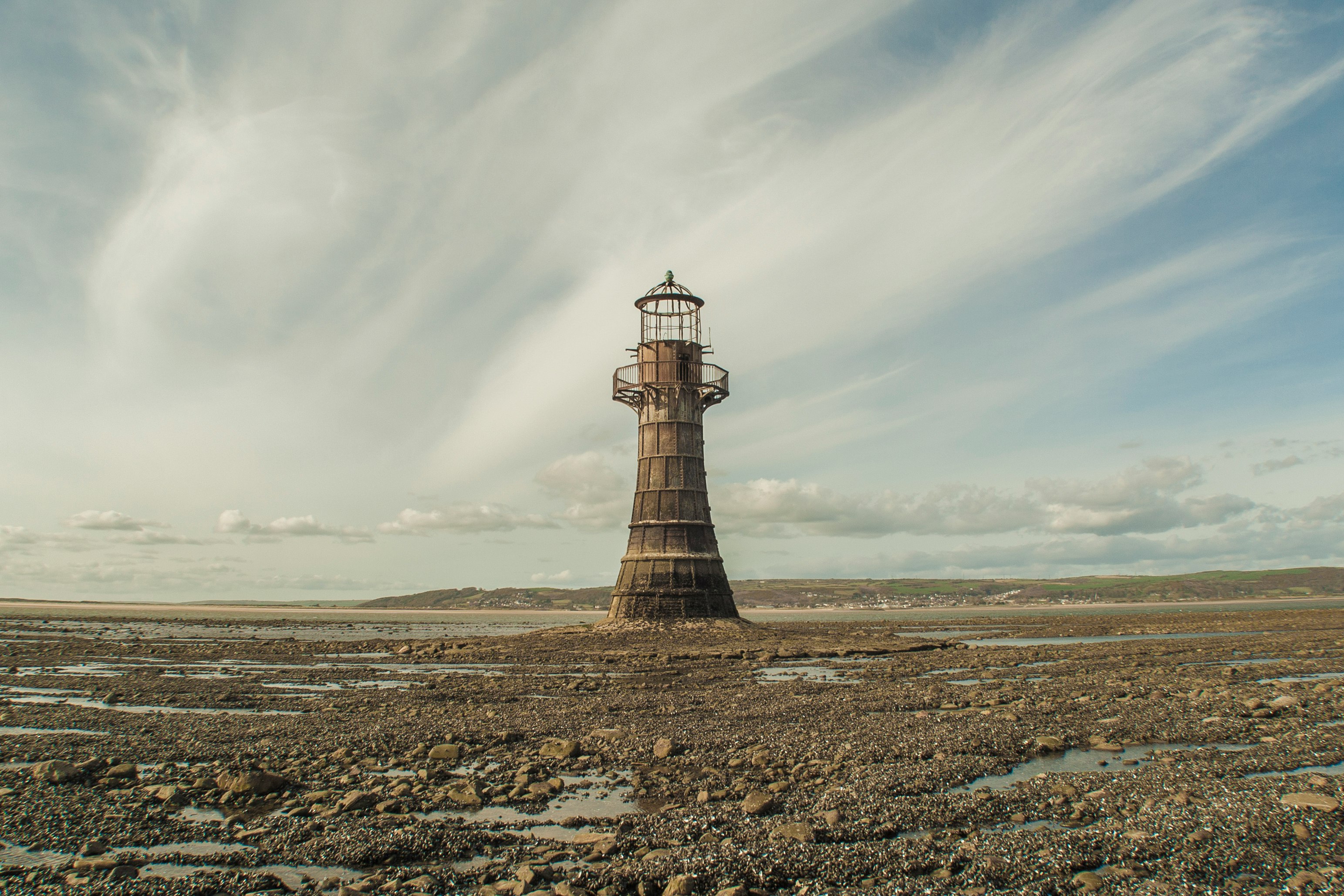 brown lighthouse during daytime